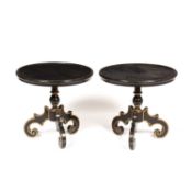 A pair of black lacquered occasional tables with gilded decoration and three scrolling legs, each