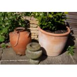 A terracotta planter 53cm diameter x 45cm high together with a terracotta jar, 42cm high and a small