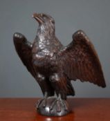 An antique carved oak dark stained eagle 61cm wide x 67cm highCondition report: With minor marks due
