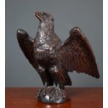 An antique carved oak dark stained eagle 61cm wide x 67cm highCondition report: With minor marks due