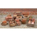 A collection of various terracotta plant pots in a mixture of sizesCondition report: Some with
