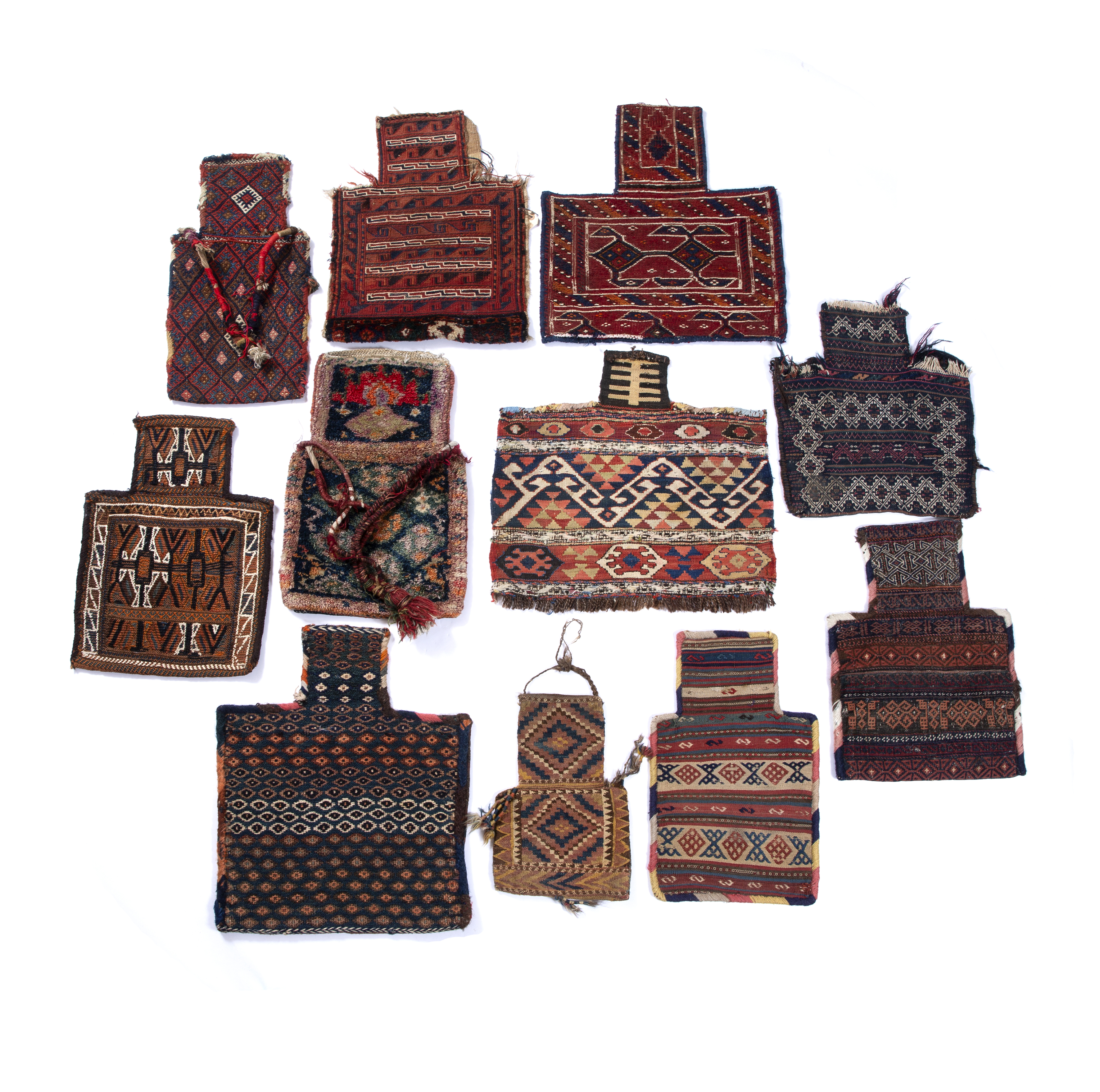 A group of eleven Azerbaijan salt bags of varying design and some with tassel ornament