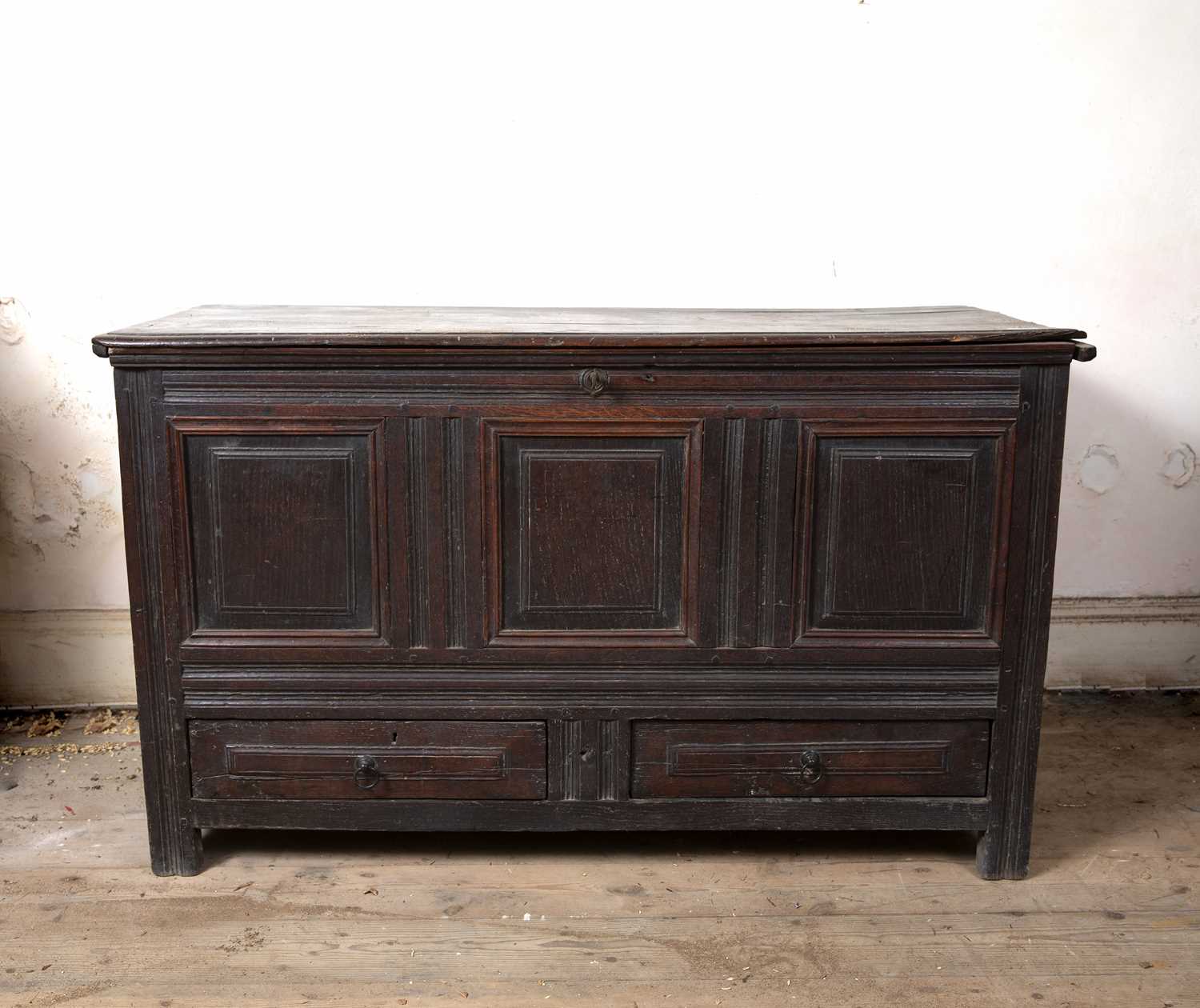 A late 17th Century oak coffer, with triple panelled front above two drawers, on block feet, 124cm - Image 2 of 5