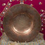 A Middle Eastern copper alloy circular shallow bowl with incised decoration, 40cm diameter