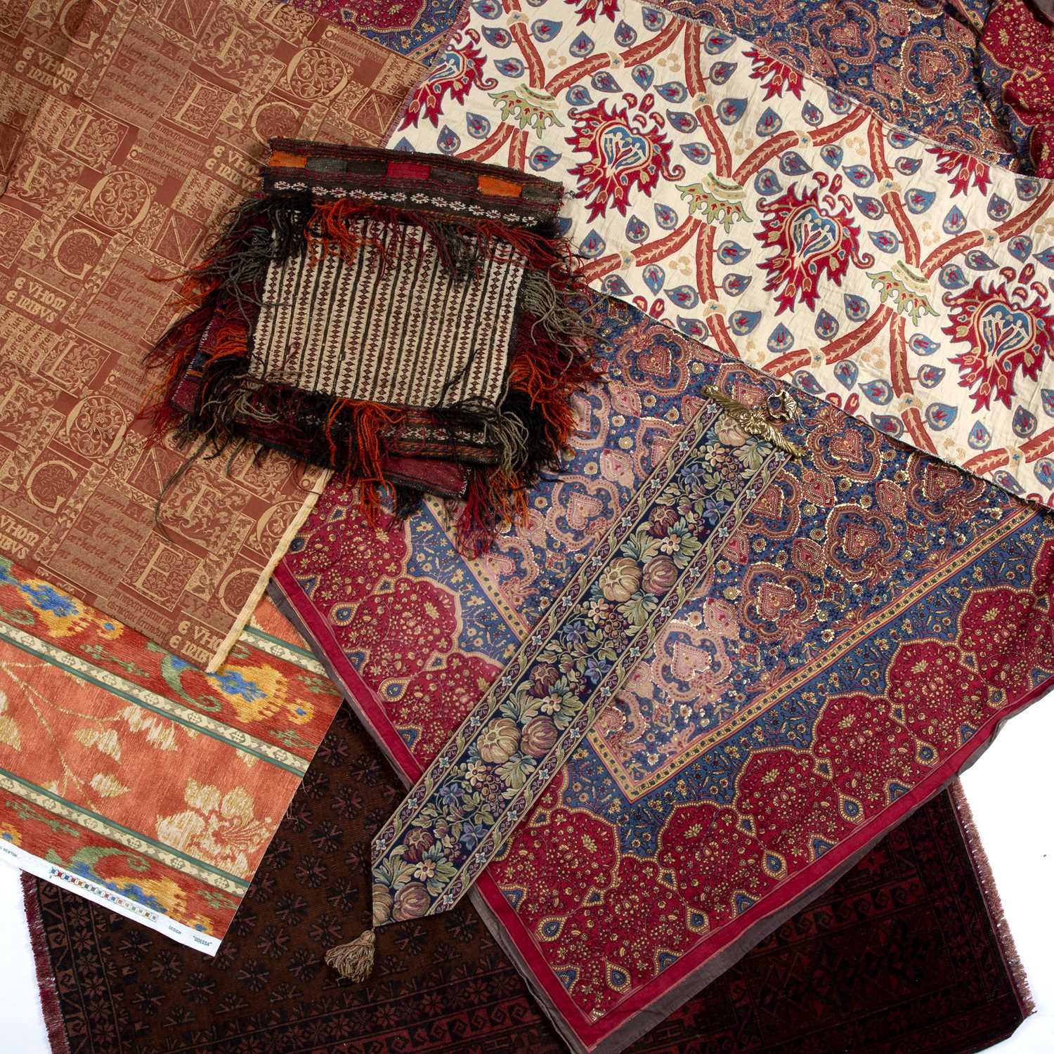 An Afghan saddlebag with banded decoration and flat weave back, 94 x 47cm, an old Belouch rug, an