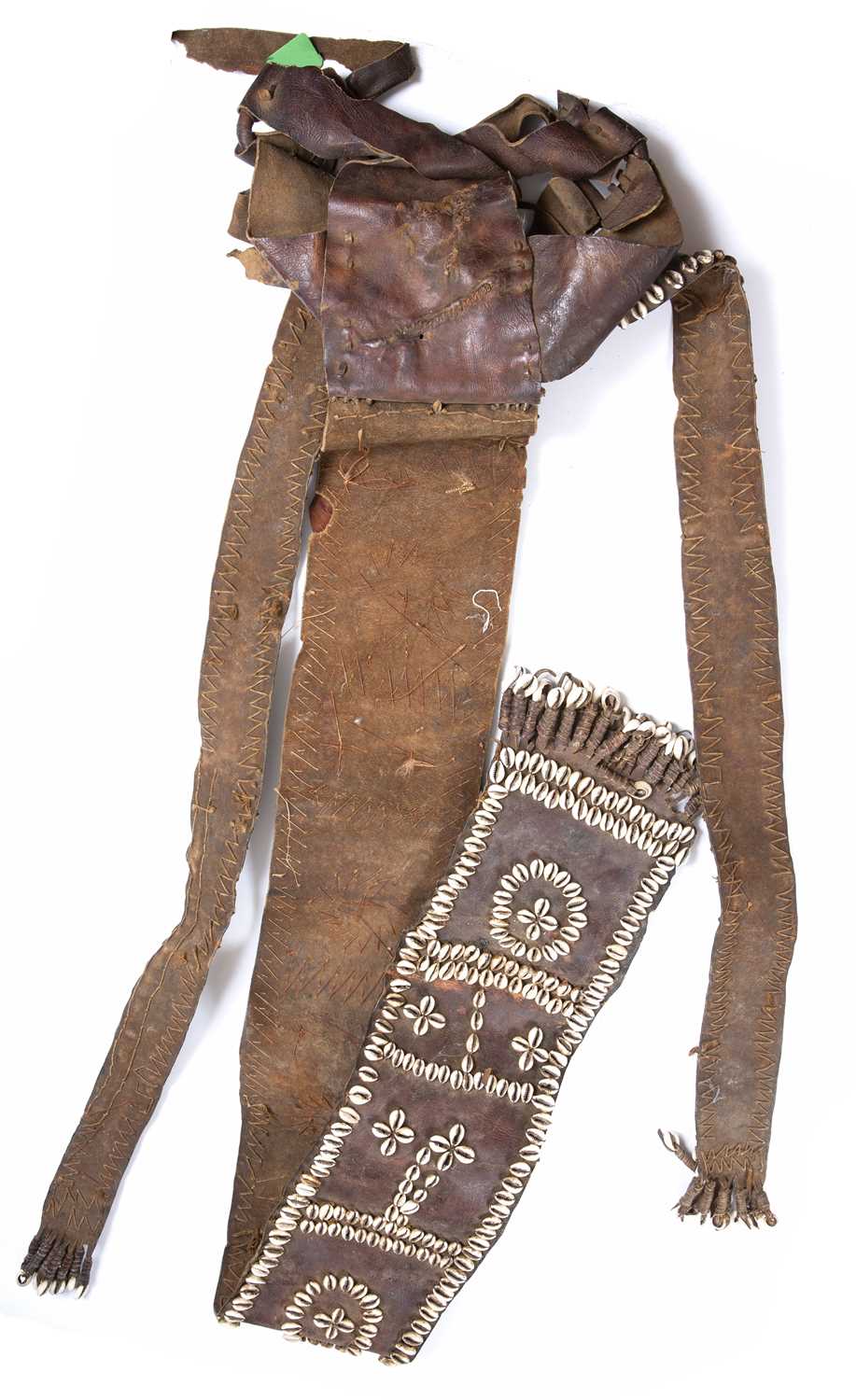 A Large Ethiopia ceremonial leather apron, decorated with cowrie shells, 180cm long approx. - Image 2 of 2