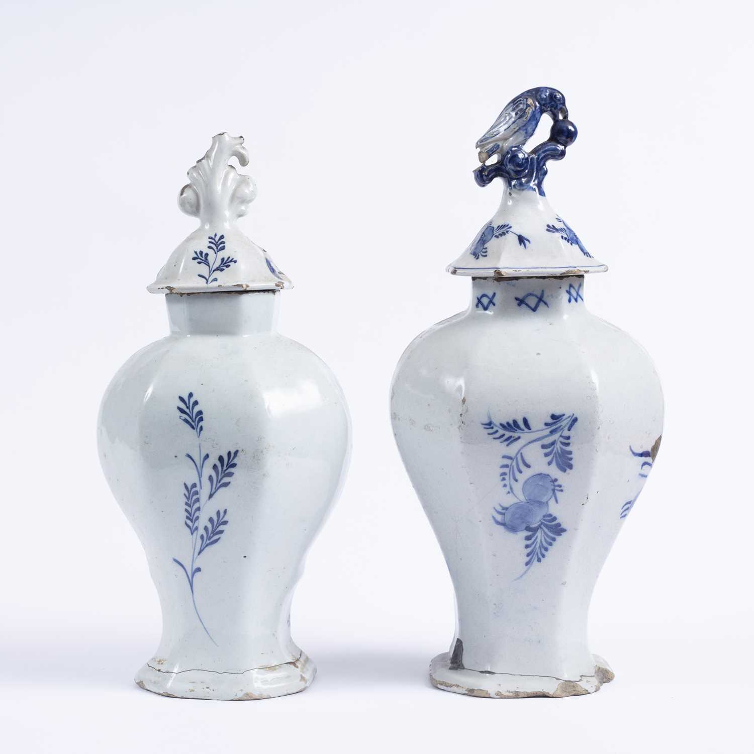 Two late 17th/18th century Delft blue and white pottery vases with covers, each decorated pastoral - Image 2 of 3