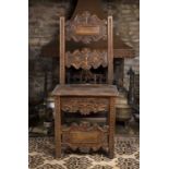 A late 18th century French hardwood side chair, the tall back with shaped and scroll carved splats