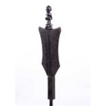 A Luba-Hemba sceptre on stand, Democratic Republic of the Congo, carved wood fish tail shape with