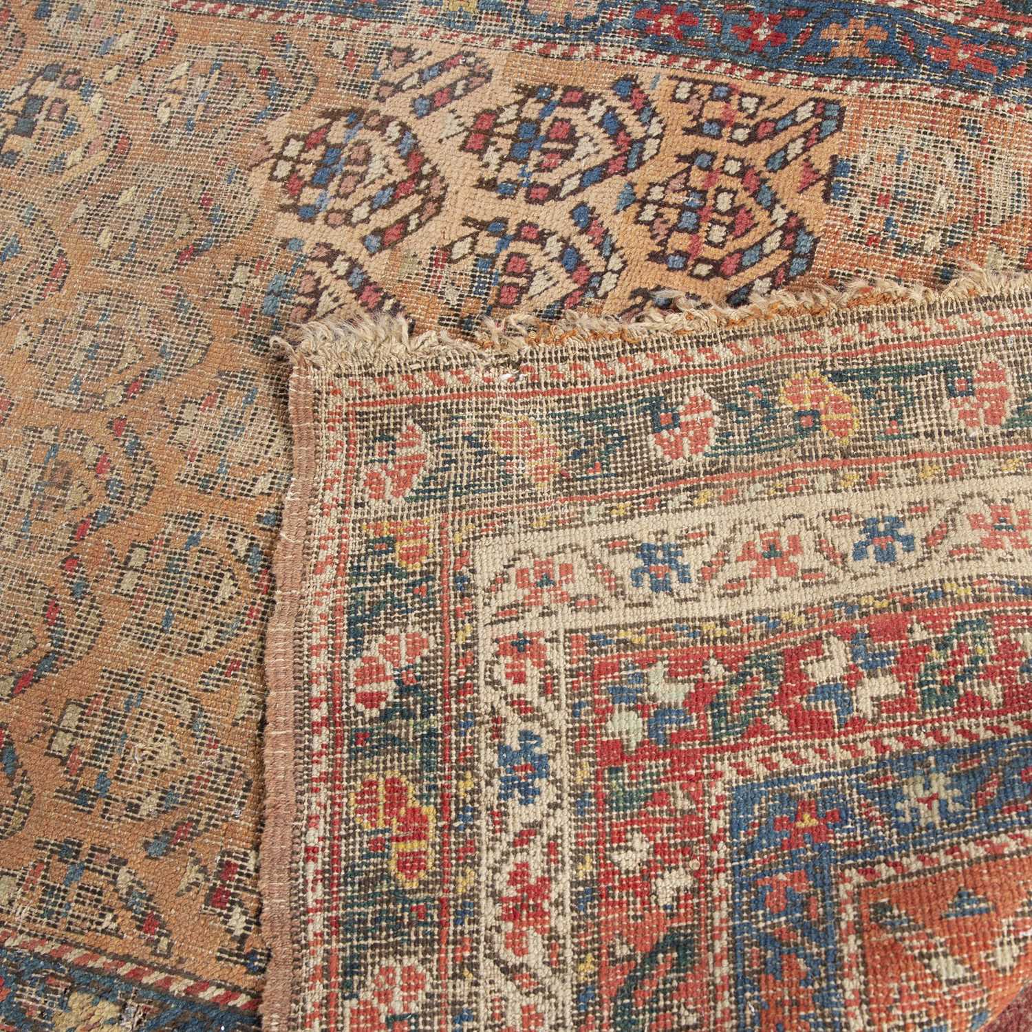 A North West Persian runner with a repeating boteh motif on a red ground with quadruple border, - Image 3 of 3
