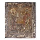 An Antique Orthodox icon depicting two saints with Cyrillic inscription on a pine panel, 36 x 31cm