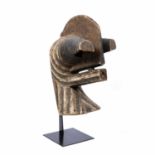 A 20th century male Kifwebe, Songye mask with stand, wood carved with central tall upstanding