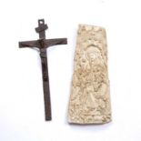 An old naive iron crucifix, 38cm and a plaster plaque portraying the Holy Mother and Child with