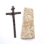 An old naive iron crucifix, 38cm and a plaster plaque portraying the Holy Mother and Child with