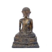 An antique Thai bronze seated Buddha, formerly gilded on an integral stepped base, 25.5cm high