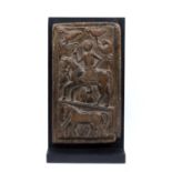 A 19th century Indian, Himachal Pradesh, carved wooden door panel decorated with a horseman