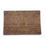 A Benin carved rectangular table top decorated five OBA figures and fighting men, 63 x 41cm