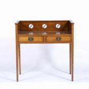In the manner of Shapland and Petter Arts and Crafts desk, with a pierced gallery, inlaid decoration