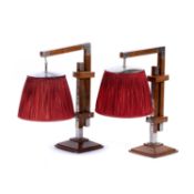 David Linley (b.1961) pair of walnut veneered table lamps with red silk shades, each marked to the