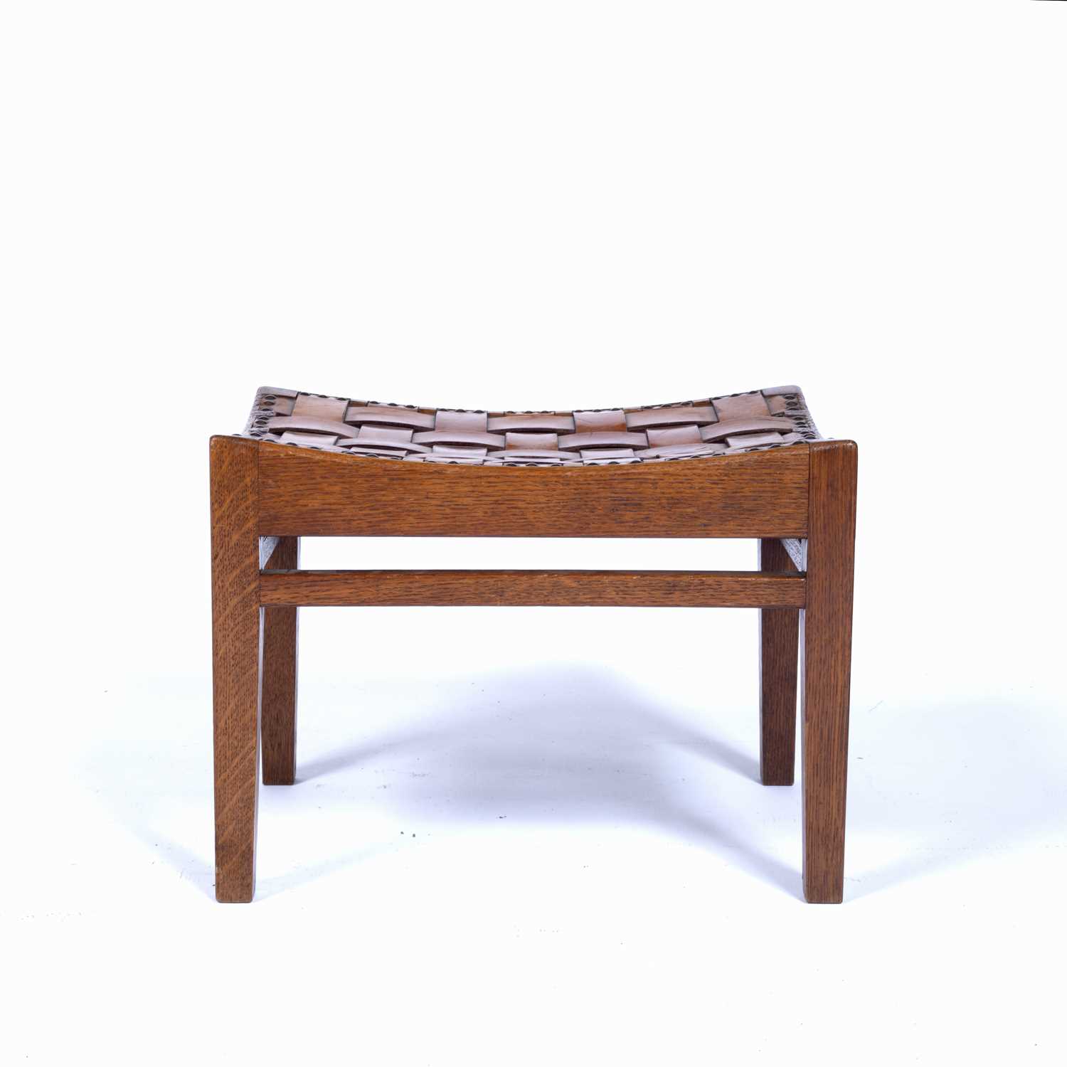 Arthur Simpson (1857-1922) of Kendal Arts and Crafts oak stool, with interwoven leather straps,