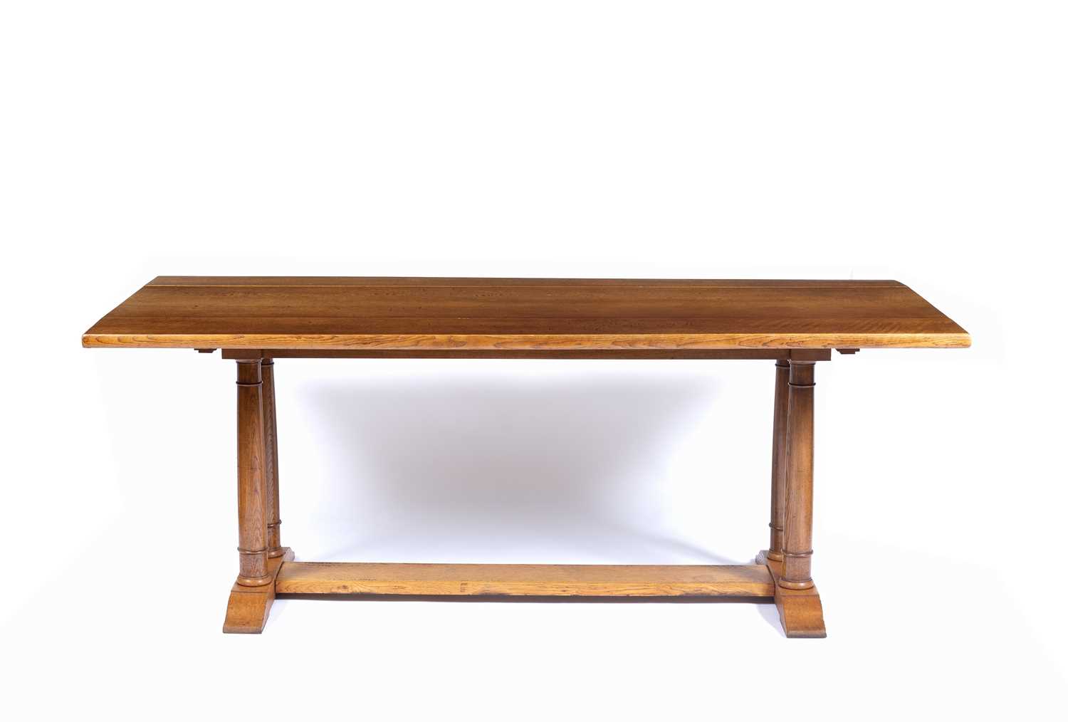 Heals 'Tilden' oak refectory table, circa 1920, with later modifications to make it into a drop-leaf