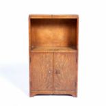In the manner of Heals small oak cupboard, 36cm x 62cm x 16cmCondition report: One handle is