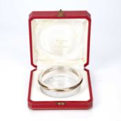 Les Must de Cartier cased silver tri-coloured rimmed glass dish, or ashtray with indistinct
