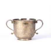 Silver twin handled trophy cup or porringer with beaten effect surface, bearing marks for Solomon