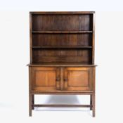 Heals oak dresser, circa 1930, 122cm x 182cm x 52cm Literature: Heals dining room furniture