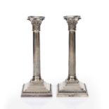 Pair of silver Corinthian column candlesticks bearing marks for James Dixon & Sons Ltd, Sheffield,