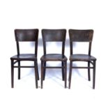 In the manner of Thonet three bentwood stools or chairs, one stamped 'Made in Romania' to the