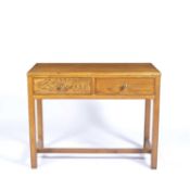 Gordon Russell of Broadway oak side table, the two drawers with brass handles, plaque to the