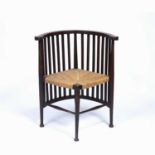 In the manner of Liberty & Co oak Arts and Crafts chair with raffia seat, 74cm highCondition report: