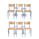 1960's set of six stacking chairs, plywood seats and supports with metal frames, stamped to the