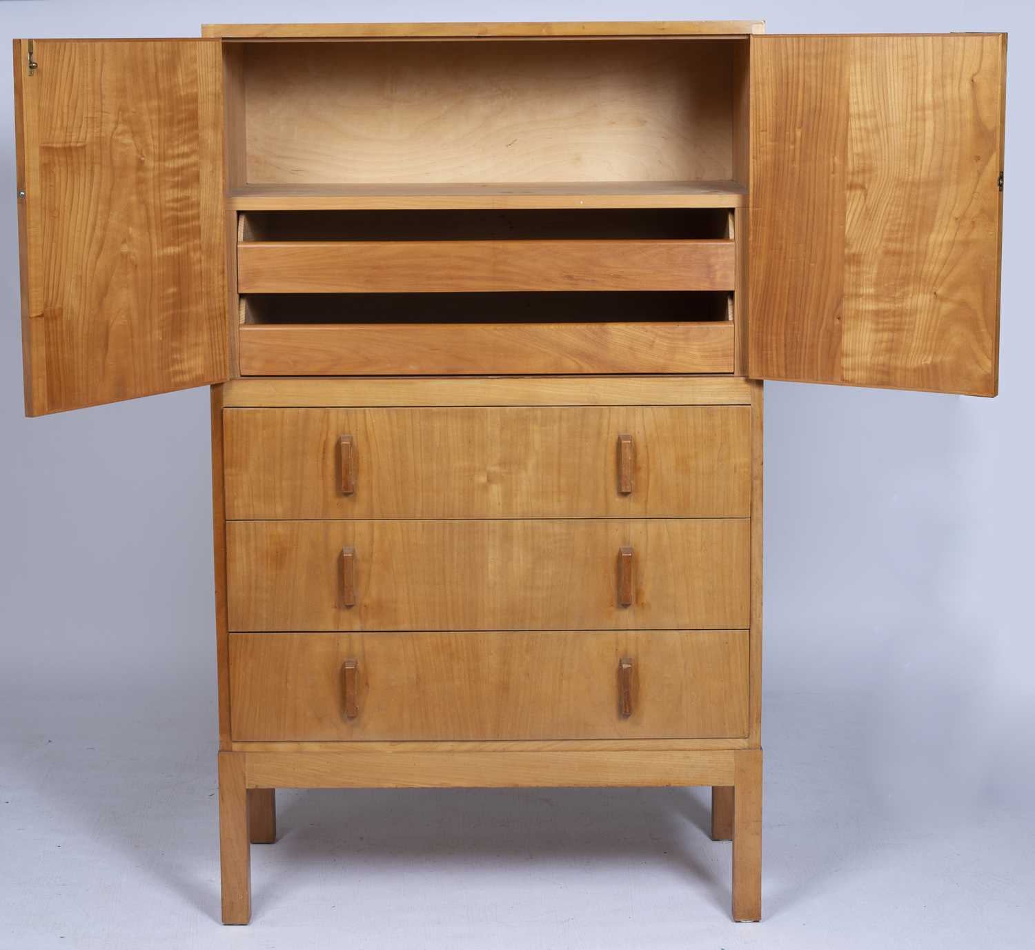 Gordon Russell (1892-1980) walnut tallboy, two doors over three drawers, copper plaque to the - Image 2 of 6