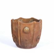 In the manner of Compton pottery Terracotta planter, with roundel decoration, unmarked, 37cm x