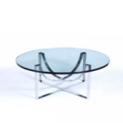 Manner of Merrow Associates coffee table, circa 1960, circular glass top with chrome base, 102cm
