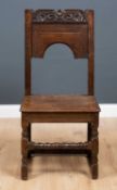 A late 17th / early 18th century oak panelled chair 50cm wide x 42cm deep x 104cm highCondition