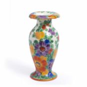 A decorative Czechoslovakian pottery vase of baluster form, with flared rim and decorated with