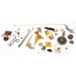 A collection of jewellery and costume items, to include assorted white metal mounted dress rings,