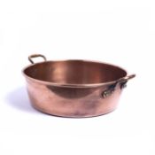 An antique copper jam pan with looping handles, 40cm diameter Condition report: Minor marks due to