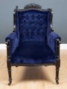 A black painted dark blue upholstered wing back armchair 64cm wide x 87cm highCondition report: