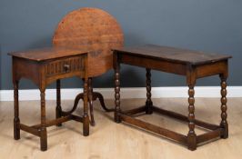 An antique oak rectangular topped table with bobbin turned legs, together with a mid 20th century