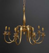 A gilt eight branch electrolier with acanthus leaf moulded scrolling arms, 62cm diameter x 58cm