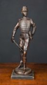 A Bronze sculpture of a Hussar, 11cm wide x 39cm highCondition report: In good condition with