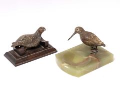 A cold painted bronze snipe mounted on an onyx ashtray and a further cold painted bronze