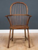 A 19th century ash and elm spindle back Windsor armchair 61cm wide x 50cm deep x 48cm high at the