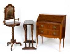 A Continental walnut shaving stand with a shaped mirror, candle sconces, two small drawers beneath
