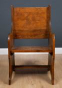 An antique oak hall chair of panelled construction, 62cm wide x 52cm deep x 94cm highCondition
