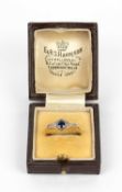 An 18 carat gold sapphire and diamond set ring 2.5 gramsCondition report: Unmarked to the back of